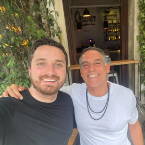 Photo of two men outside of a restaurant - José Miguel Quezada Andreu and Luis Miguel Ormeño